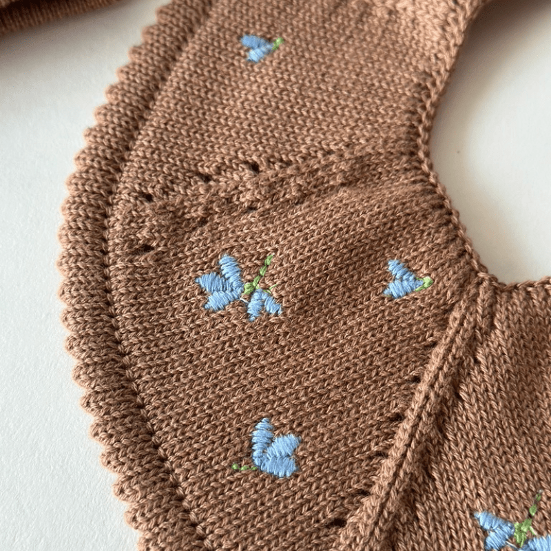 Knitted Baby Bib by Saga Copenhagen - Maude Kids Decor