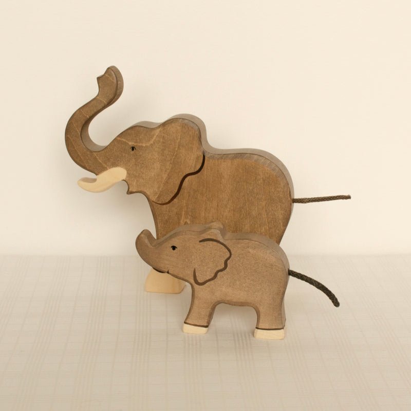 Wooden Elephant Figurine | Small Trunk Raised by Holztiger - Maude Kids Decor