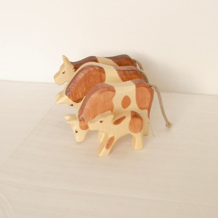 Cow Wooden Figurine | Eating by HolzWald - Maude Kids Decor
