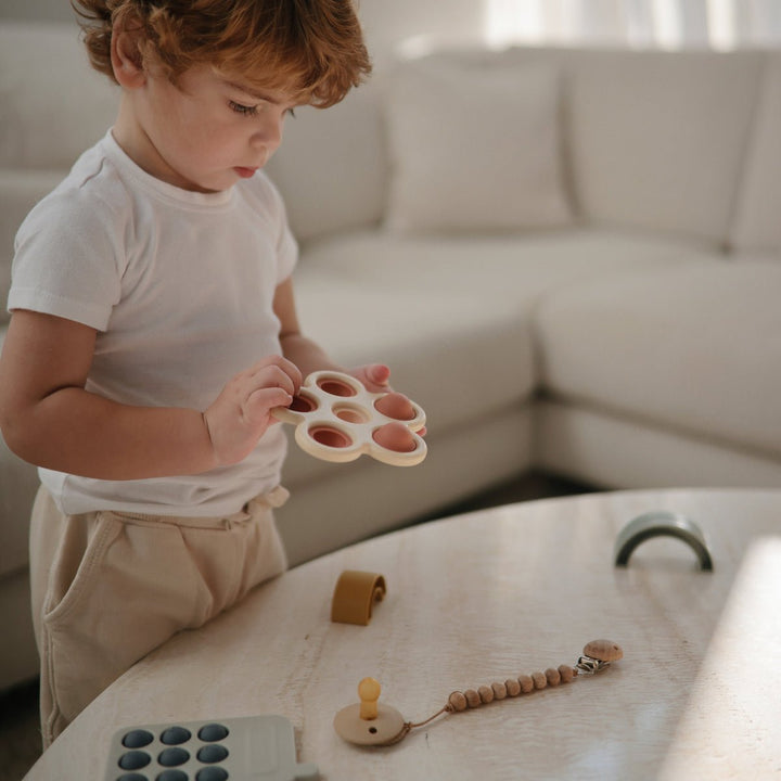 Flower Press Toy | Rose, Blush + Shifting Sand by Mushie - Maude Kids Decor